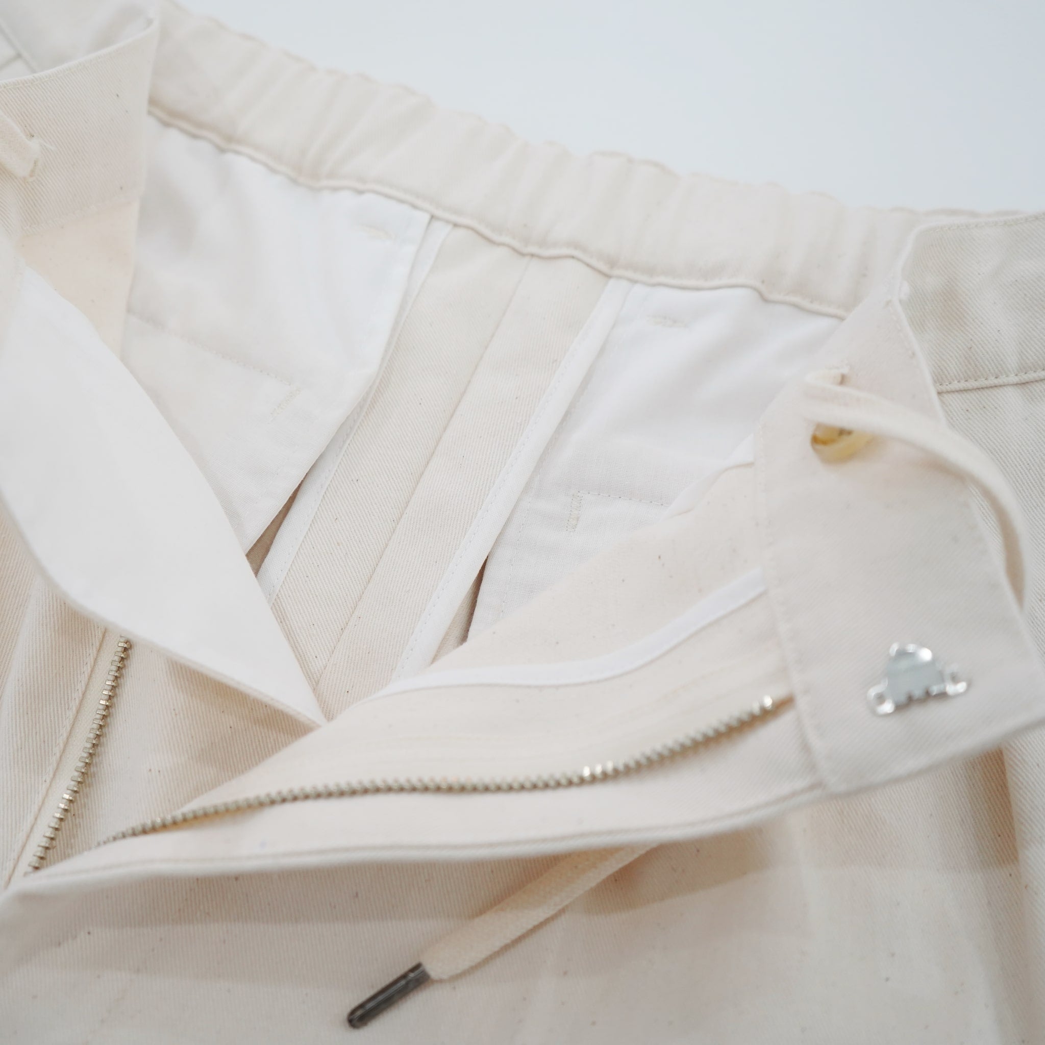 TWO TUCK EASY TROUSERS